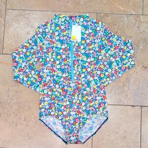 Mini Boden girl one piece rash guard. Blue floral. Size 9-10Y.